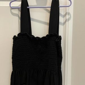 Black cropped tank top. Smocked in the middle